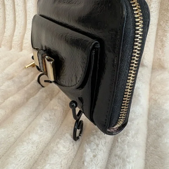 Sold.
Chloe Black Leather Wallet with Gold Bow Hardware. Refurbished - Picture 2 of 10